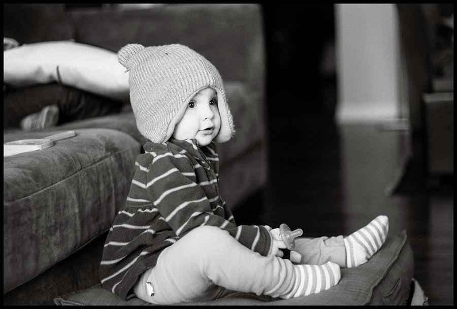 Sitting with her hat